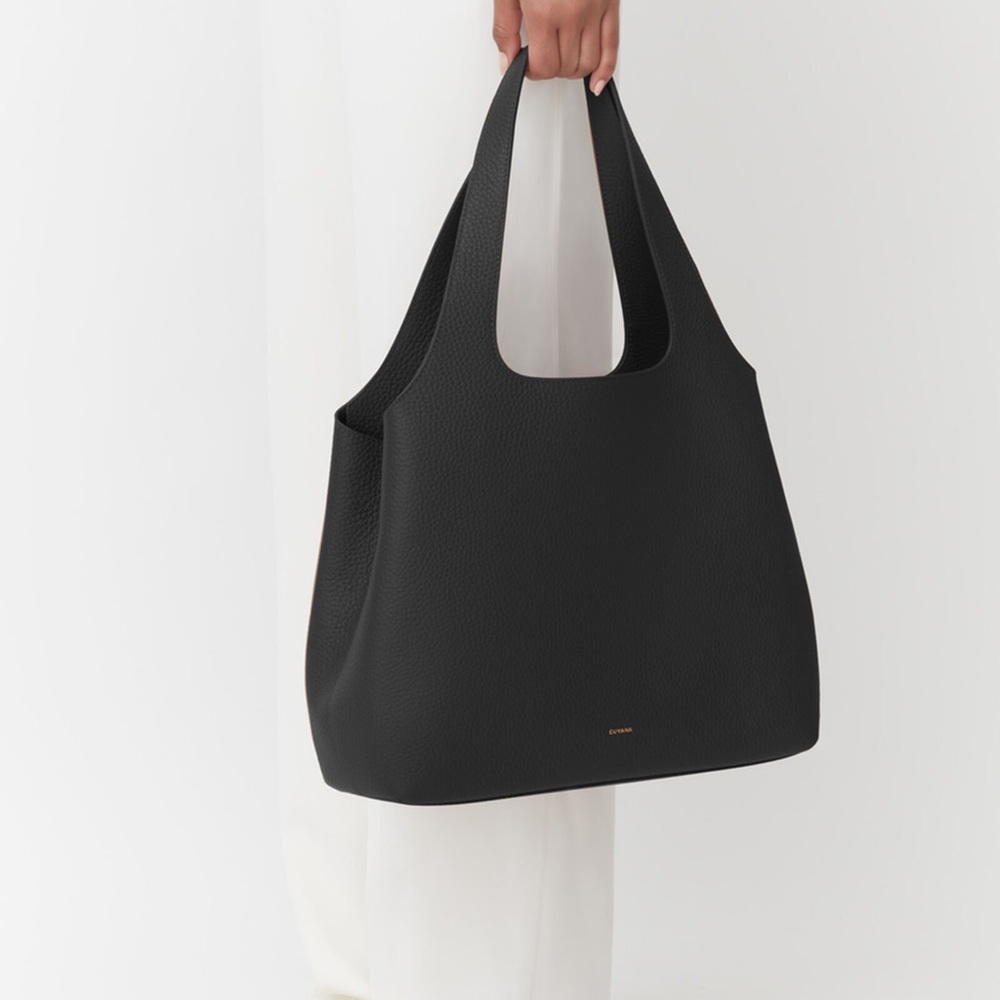 Cuyana 16” system tote in black pebbled leather with gold hardware